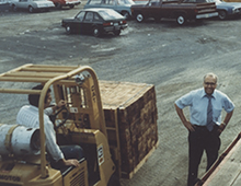 Fork truck operator with a load of wood blocks
